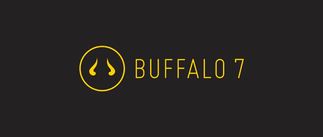 The word Buffalos and horn inside the circle with golden color in Block color background