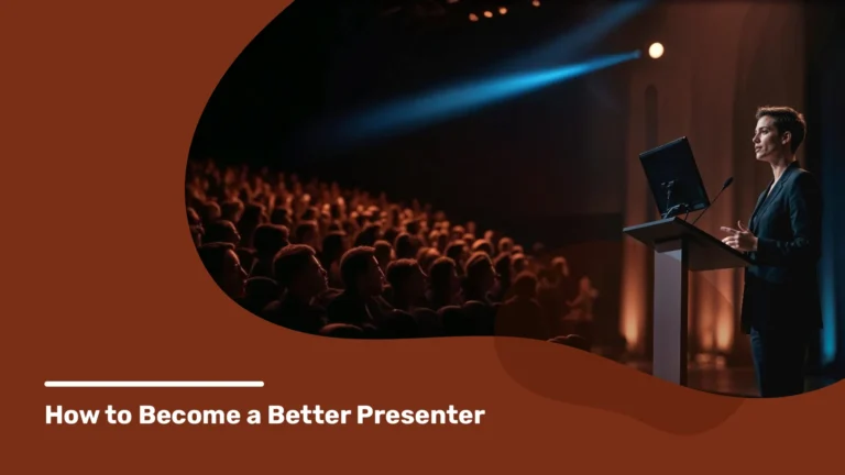 Image of a presenter speaking at a podium in a dimly lit auditorium filled with an attentive audience.