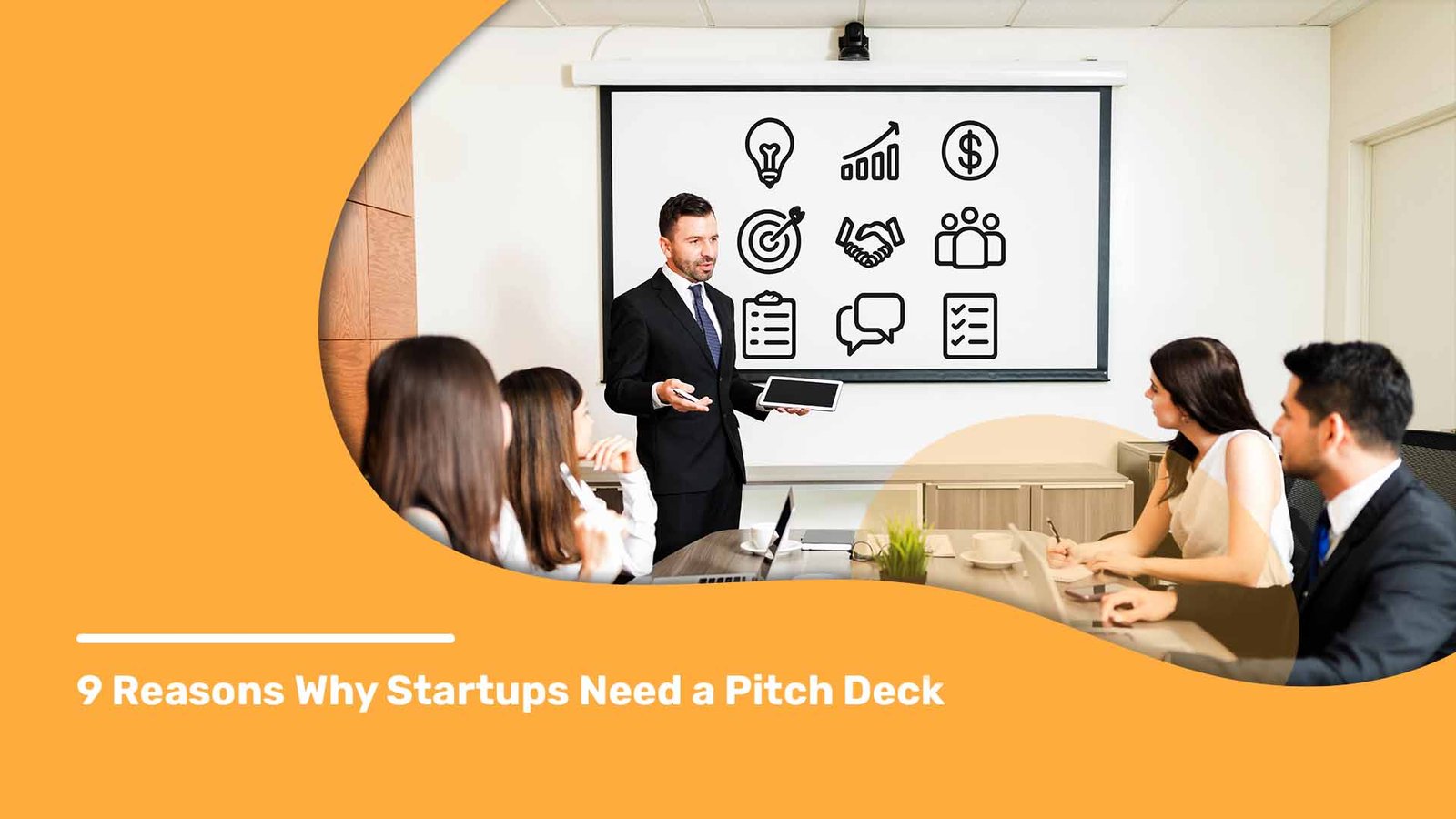 A man in a suit presents in a meeting room, with a screen showing business icons, titled "9 Reasons Why Startups Need a Pitch Deck