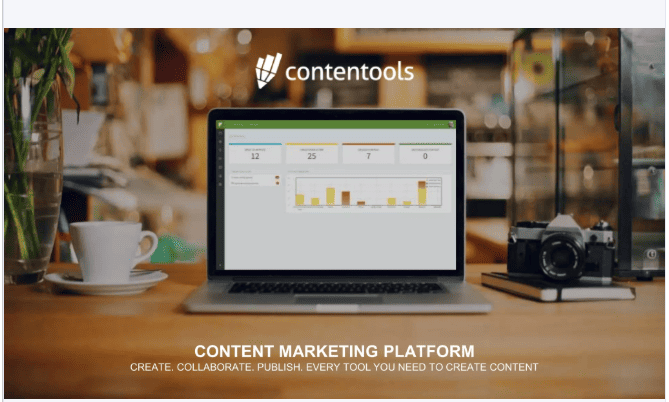 Laptop on a wooden desk displaying the Contentools marketing dashboard with charts and data, in a creative workspace.