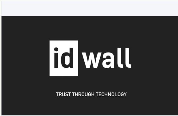 Logo and tagline for "id wall," a company promoting "Trust Through Technology," on a dark gray background.